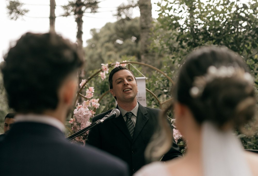 Traditional outdoor Christian wedding ceremony